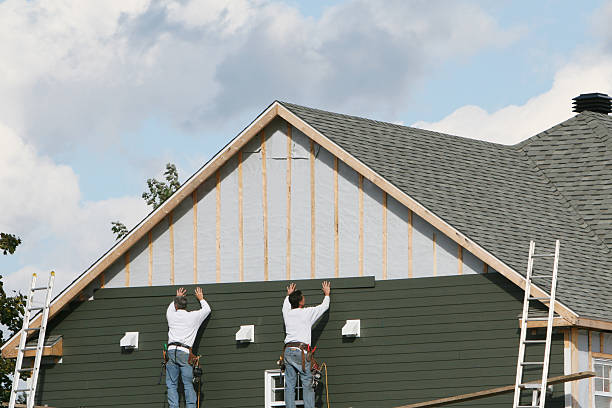 Professional Emergency Siding Repair technician working in Kenmore, NY